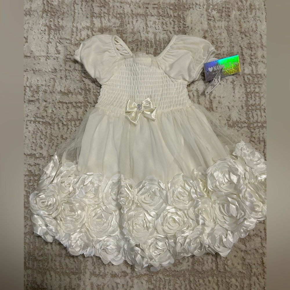 Beautiful ivory baby girl dress. NWT
